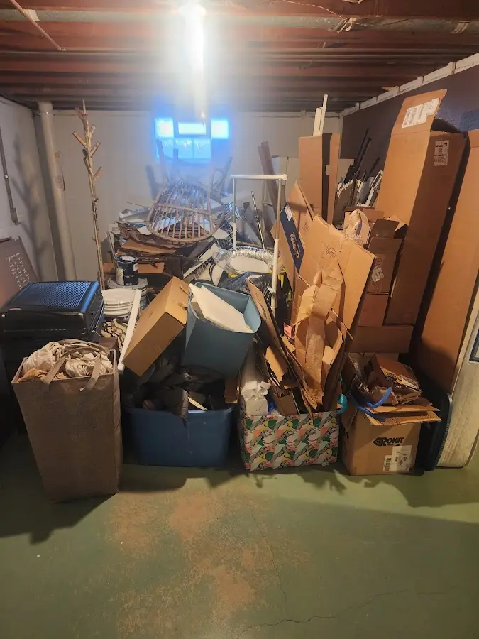 Roll-off dumpster container at job site for 2 Yard Dumpster Rental in Avon